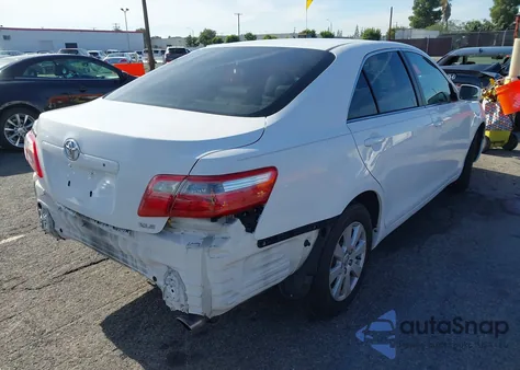 2007 Toyota Camry Xle z USA, uszkodzony, nr VIN 4T1BE46K17U618761